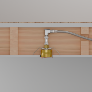 Underfloor plumbing supply line with a brass shut-off valve and flexible braided hose connected to a metal elbow fitting on a wooden joist cavity