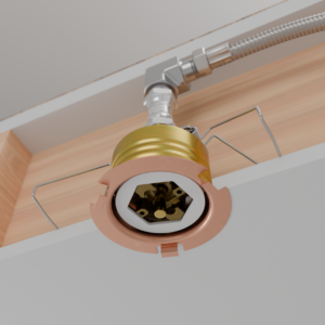 Close-up of a recessed ceiling light fixture with copper ring and exposed inner components.