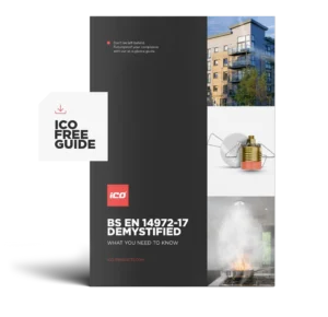 Dark brochure cover titled 'BS EN 14972-17 Demystified' with a white 'ICO FREE GUIDE' tag on the left and a photo collage on the right (building, light bulb, stove).