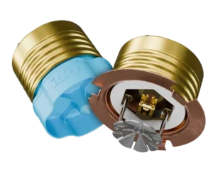 Faucet cartridge with brass outer shell and blue plastic seal exposed for repair
